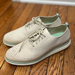 Cole Haan Grand 360. Women’s Size 9.  Cream with teal stripe on sole.